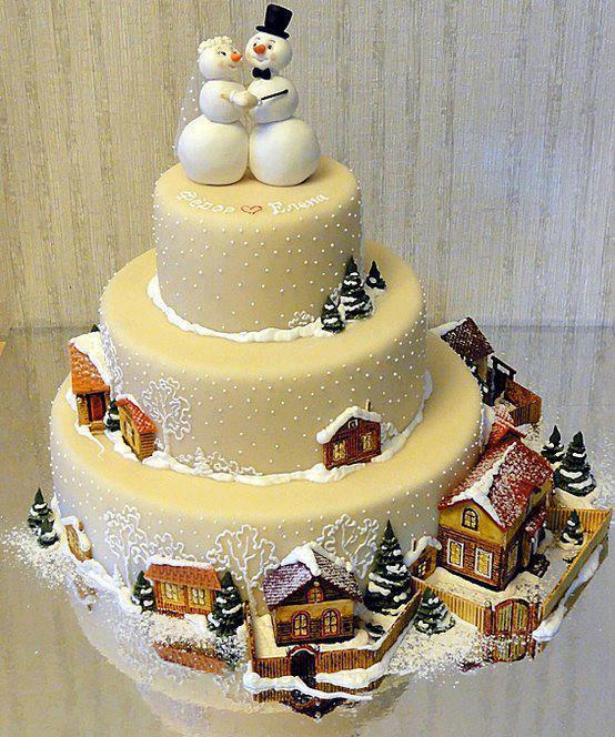 Gingerbread snowmen and houses figures on Christmas cake