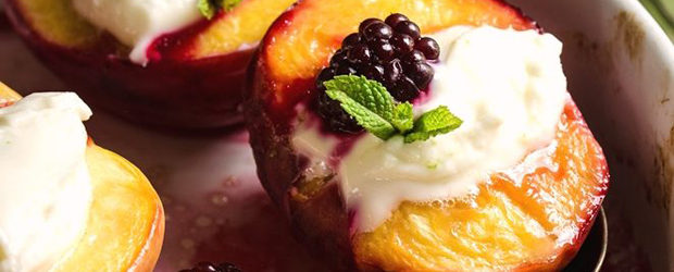Oven roasted peaches with fresh cheese and blackberries