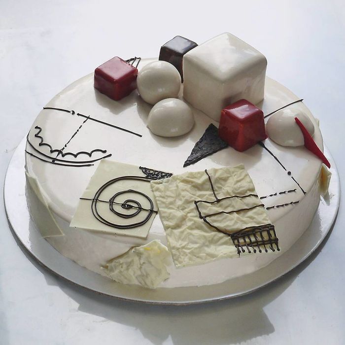 Chocolate worlds on the mirror glaze cakes by Marie Troïtskaia