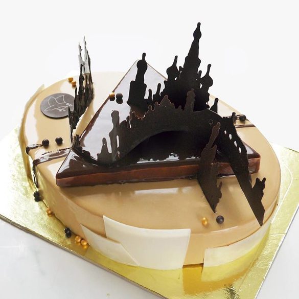 Chocolate worlds on the mirror glaze cakes by Marie Troïtskaia